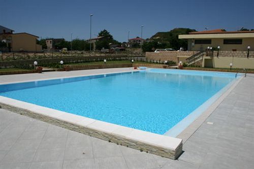 Baia Dei Canonici Aparthotel Villaggio Le Rocelle Kültér fotó